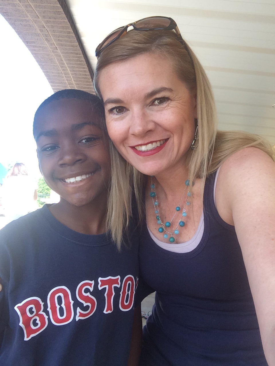 Cassie Arner first considered adoption after getting to know the stories of many of her student-athletes who had been fostered.